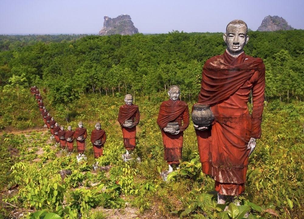 Statues of Buddhist Monks in the Forest, Mawlamyine, Myanmar