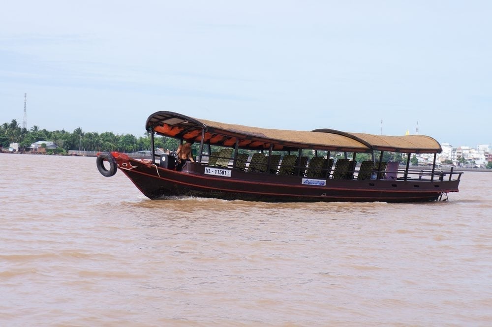 Wooden tourist boat on Can Tho River