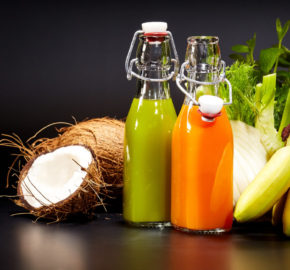 Glasses with fresh vegetable juices isolated on black. Detox